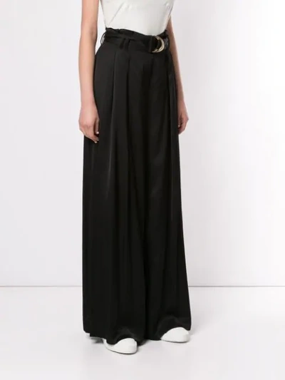 Shop Aje Belted Palazzo Pants In Black
