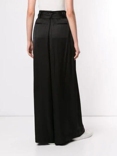 Shop Aje Belted Palazzo Pants In Black