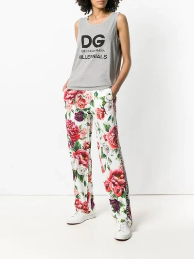 Shop Dolce & Gabbana Peony Print Track Pants In White