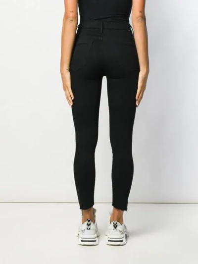 Shop Mother Stunner Skinny Jeans In Black