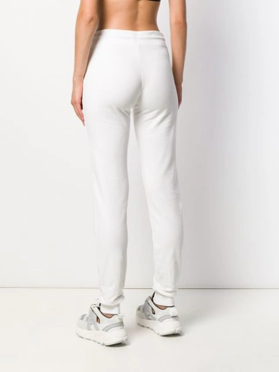 Shop Plein Sport Branded Track Pants In White
