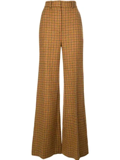 Shop Khaite Flared Gingham Trousers In Brown
