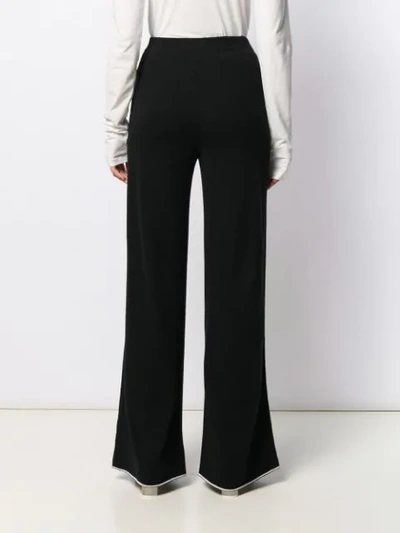 Shop Jil Sander Flared Cashmere Trousers In Black