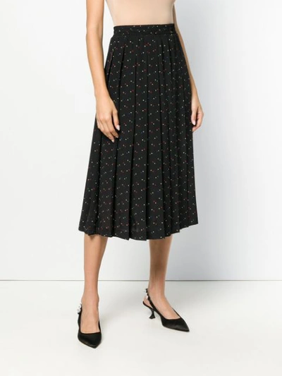 Shop Miu Miu Pleated Star-print Skirt - Black
