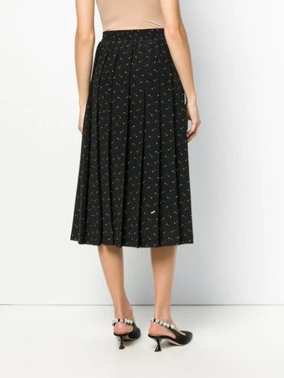 Shop Miu Miu Pleated Star-print Skirt - Black
