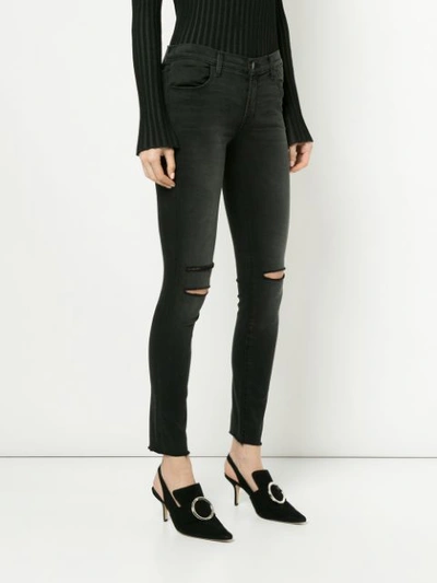 Shop J Brand Ripped Skinny Jeans - Black