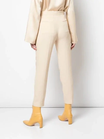 Shop Rosetta Getty Cropped Tapered Trousers In Neutrals