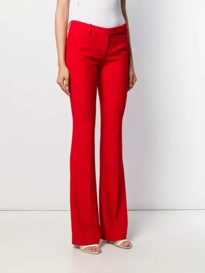 ALEXANDER MCQUEEN FLARED PLEATED TROUSERS - 红色