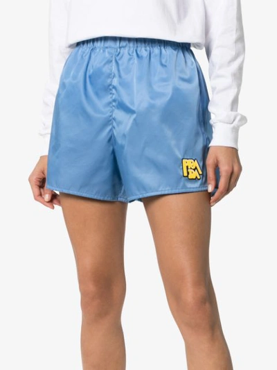 Shop Prada Logo Patch Shorts In Blue