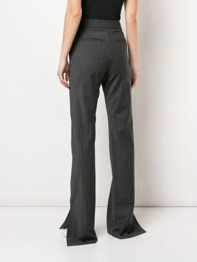 Shop Tibi Flared Pinstripe Trousers In Grey
