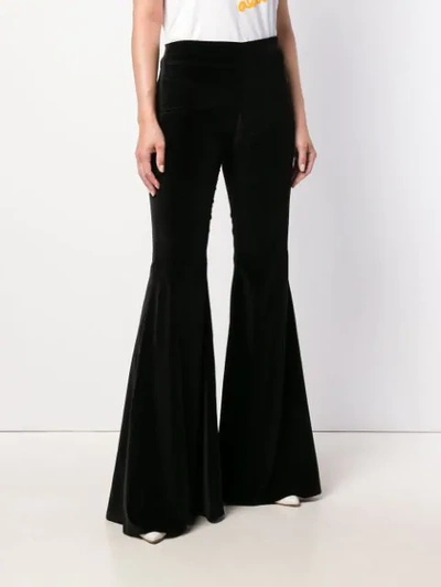 Shop Alice And Olivia Flared Trousers In Black