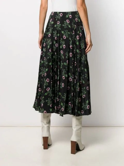 Shop Valentino Pleated Floral Print Skirt In Black