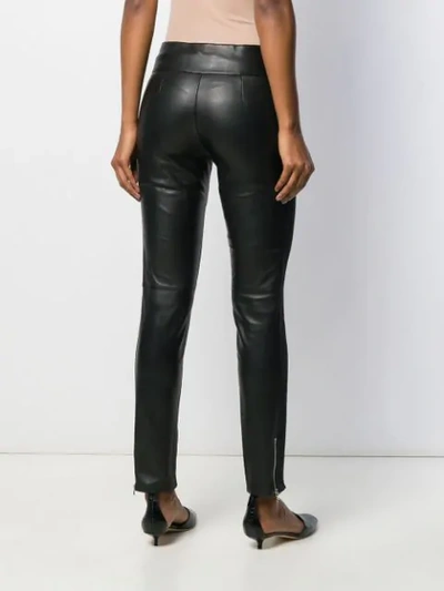 Shop Emporio Armani Skinny Leather Trousers In Black