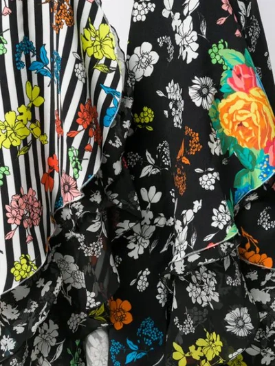 Shop Versace Floral Print Jumpsuit In Black