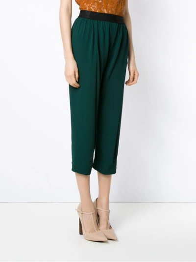 Shop À La Garçonne Cropped Trousers In Green