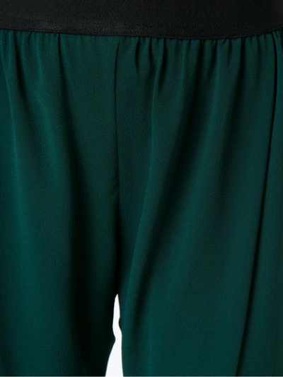 Shop À La Garçonne Cropped Trousers In Green