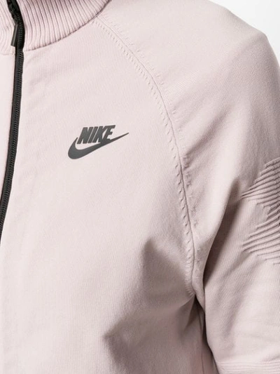 Shop Nike Tech Knit Zipped Jacket - Pink
