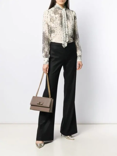 Shop Giambattista Valli Flared Trousers In Black