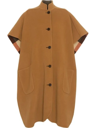 Shop Burberry Reversible Check Oversized Poncho In 1002 Camel