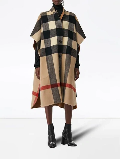 Shop Burberry Reversible Check Oversized Poncho In 1002 Camel
