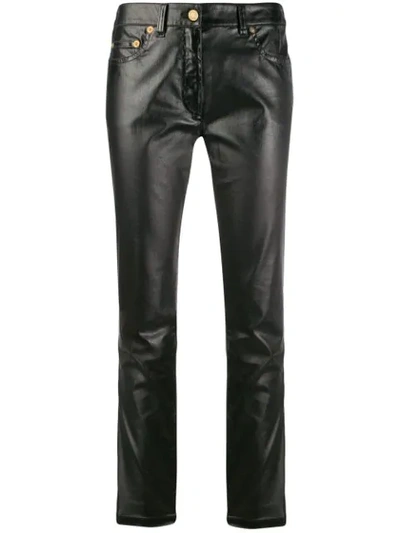 Shop Moschino Leather-effect Slim-fit Trousers In Black