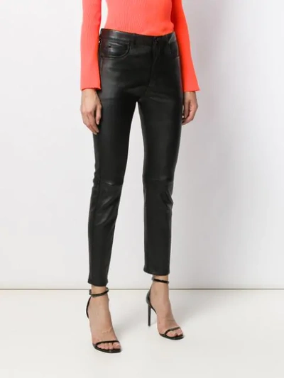 Shop Saint Laurent Skinny Leather Trousers In Black