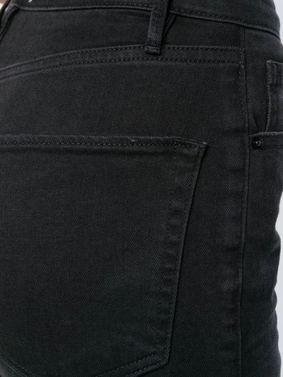 Shop Frame Flared Cropped Jeans In Black