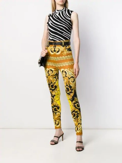 Shop Versace High Waist Baroque Trousers In Yellow