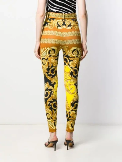 Shop Versace High Waist Baroque Trousers In Yellow