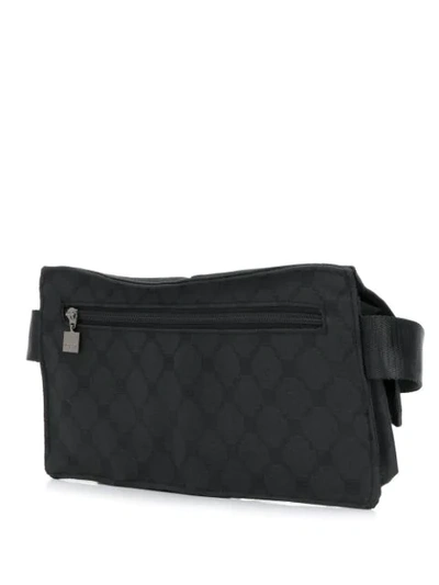 Shop Fila All-over Logo Belt Bag In Black
