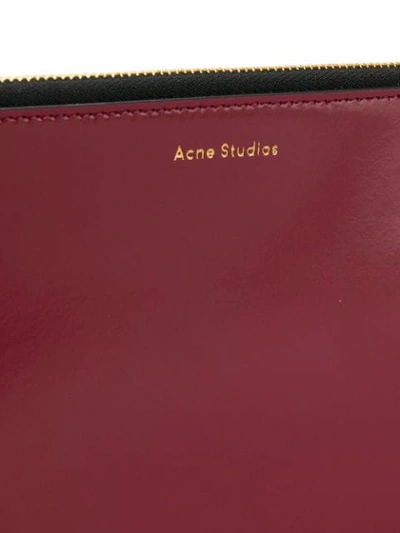 Shop Acne Studios Malachite L Clutch Bag In 479-burgundy
