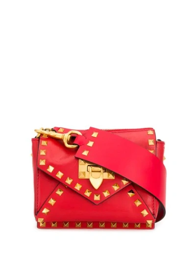 Shop Valentino Small Rockstud Shoulder Bag In Red