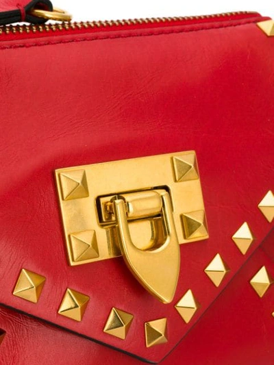 Shop Valentino Small Rockstud Shoulder Bag In Red