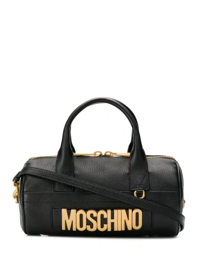 Shop Moschino Oversized Logo Tote Bag In 0555 Black