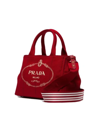 Shop Prada Red Logo Canvas Tote Bag