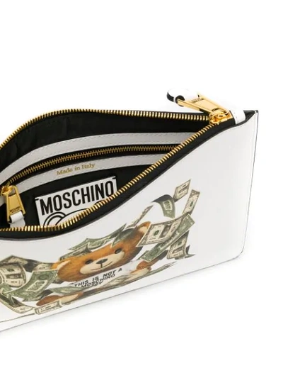 Shop Moschino Printed Logo Clutch Bag In White