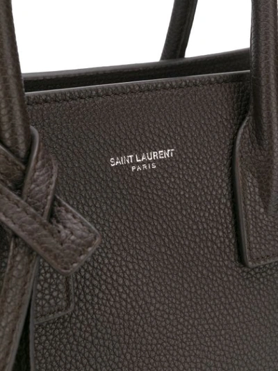 Shop Saint Laurent Logo Zipped Shoulder Bag In Brown