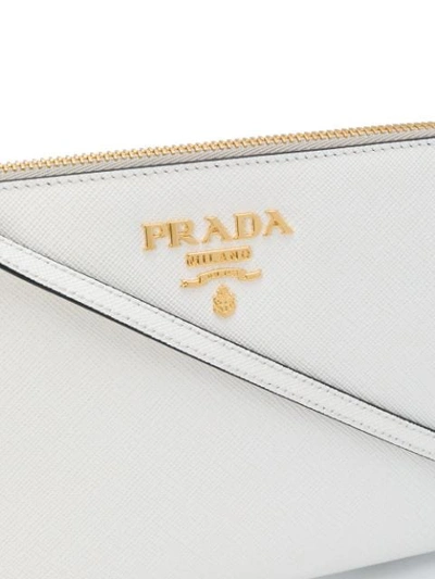 Shop Prada Logo Clutch In F0009