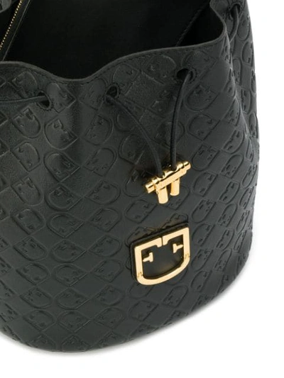 Shop Furla Embossed Logo Bucket Bag In Onyx