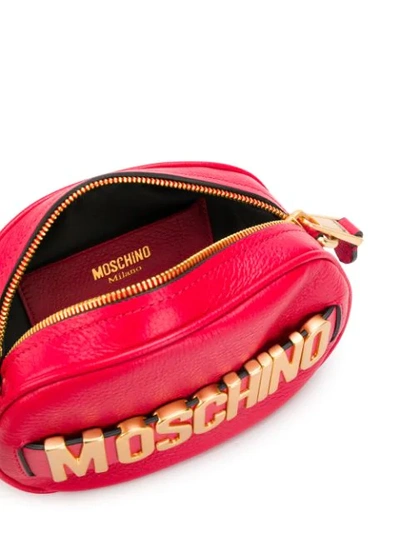 Shop Moschino Lettering Logo Plaque Shoulder Bag In Red