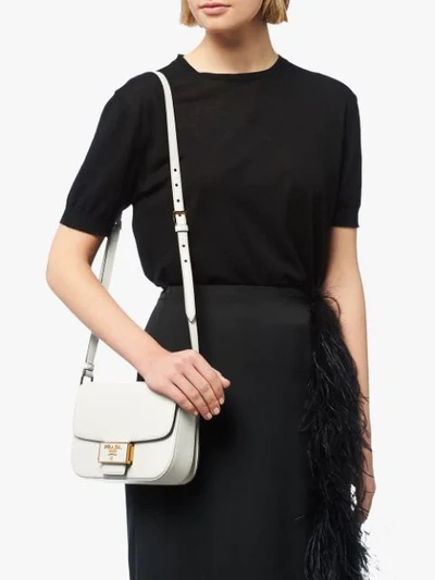 Shop Prada Emblème Saffiano Leather Shoulder Bag In White