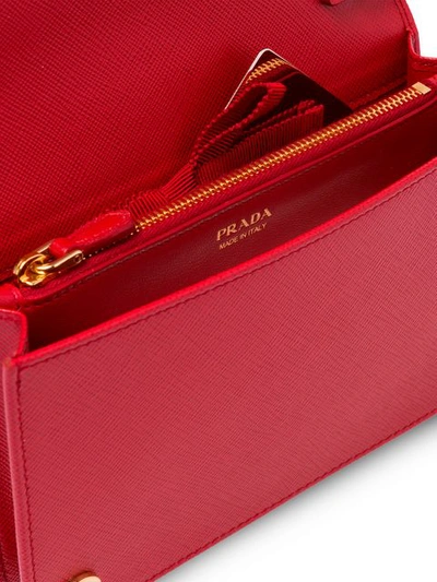 Shop Prada Saffiano Logo Shoulder Bag - Red