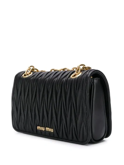 Shop Miu Miu Matelassé Leather Cross Body Bag In Black