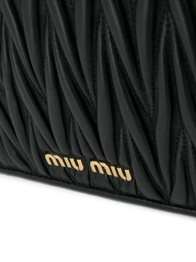 Shop Miu Miu Matelassé Leather Cross Body Bag In Black