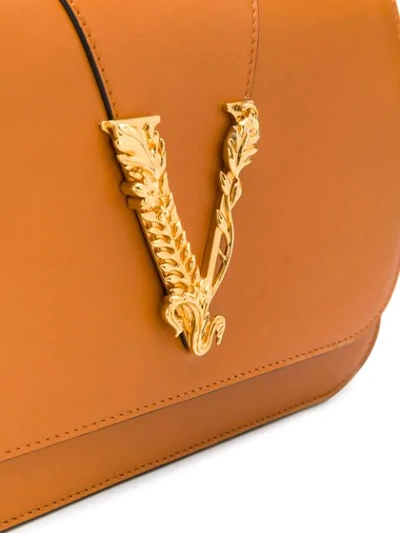 Shop Versace Leaf Logo Shoulder Bag In Brown