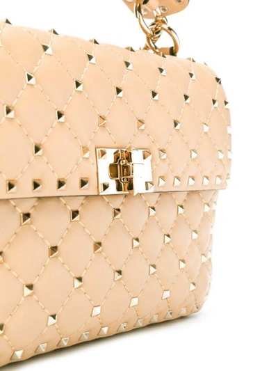 Shop Valentino Garavani Rockstud Spike Crossbody Bag - Neutrals