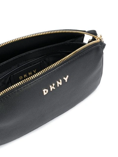 Shop Dkny Minimal Cross Body Bag In Black