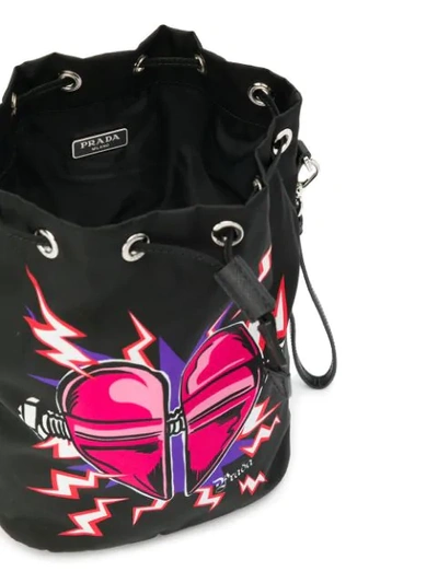 Shop Prada Heart Print Bucket Bag In Black