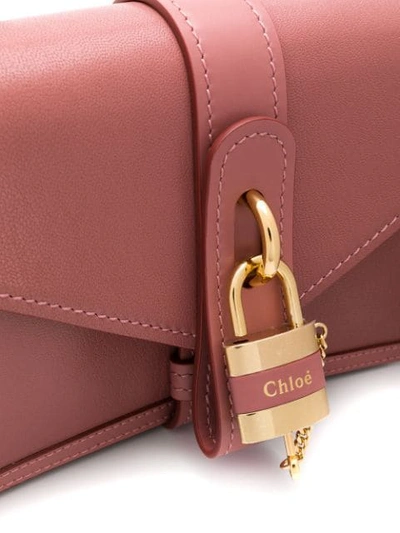Shop Chloé Aby Padlock Shoulder Bag In 6ac Rusty Pink