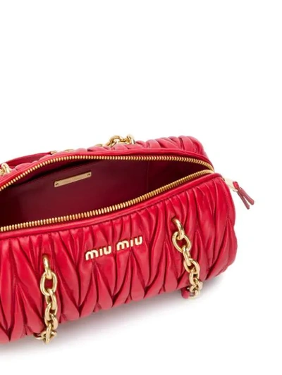 Shop Miu Miu Mattelasse Shoulder Bag In Red